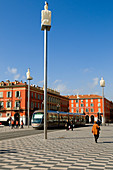 France, Alpes Maritimes, Nice, the Place Massena (Massena square) and sculpture by the artist Jaume Plensa, the tram