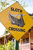 Costa Rica, Limon Province, Caribbean coast, Cahuita, sign road : sloth crossing