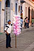Mexico, Oaxaca State, Oaxaca City, historical colonial centre listed as World Heritage by UNESCO, candy-floss seller