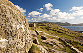 Spain, Galicia, Costa da Muerte, Muxia, granite rocks and stone enclosure