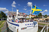 Steamboat Ceres in the lock on the Goeta Canal near Berg, close to Linkoeping, oestergoetland, South Sweden, Sweden, Scandinavia, Northern Europe