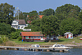 Houses on the island of Husaroe in Stockholm archipelago, Uppland, Stockholms land, South Sweden, Sweden, Scandinavia, Northern Europe