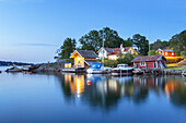Houses by the sea in Vaxholm, Stockholm archipelago, Uppland, Stockholms land, South Sweden, Sweden, Scandinavia, Northern Europe