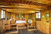 Altar of chapel near hut rifugio Denza, hut rifugio Denza, Adamello-Presanella Group, Trentino, Italy
