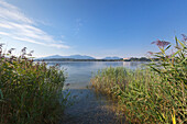 View over Chiemsee to the old castle at Herreninsel, near Gstadt, Bavaria, Germany