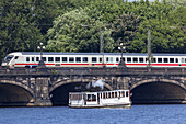Ship on the Alster under bridge Lombardsbrücke in old town, Hanseatic City Hamburg, Northern Germany, Germany, Europe