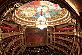 France, Paris, Garnier opera house, the auditorium and the ceiling painted by Marc Chagall, at the center the grand chandelier