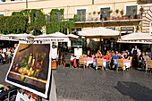 Italy, Lazio, Rome, old town, Piazza Navona, Cafe terraces and painting