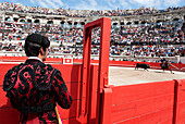 France, Gard, Nimes, horsemen during the bullfight for the Feria in the bullring