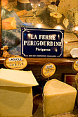 France, Dordogne, Perigord Blanc, Perigueux, cheese seller