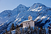 France, Savoie, Parc National de La Vanoise, Montvalezan, Chatelard Hamlet, St Michel Chapel with view on the Mont Pourri (3779m)