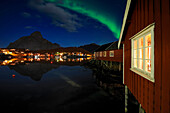 Norway, Nordland County, Lofoten Islands, Moskenes Island, aurora borealis over Reine fishermen village