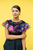 Mexico, Federal District, Mexico City, Coyoacan district, a young Mexican traditional dress of Oaxaca
