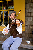 Canada, New Brunswick, the Acadian coast, the Acadian historic village of Caraquet, violin player