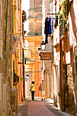 France, Alpes Maritimes, Menton, Rue du Vieux Château with the Basilique Saint Michel (Saint Michael basilica) in the background