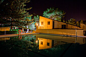 Swimming pool of Finca Predio Son Serra Hotel at night, near Muro, Mallorca, Balearic Islands, Spain