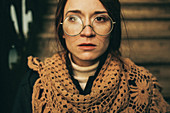 Caucasian woman wearing scarf and eyeglasses