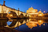 Dusk on the ancient palace of Castel Sant'Angelo with statues of angels on the bridge on Tiber RIver, UNESCO World Heritage Site, Rome, Lazio, Italy, Europe