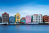 View of St. Anna Bay looking towards colonial merchant houses lining Handelskade along Punda's waterfront, UNESCO World Heritage Site, Willemstad, Curacao, West Indies, Lesser Antilles, former Netherlands Antilles, Caribbean, Central America