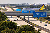 aircraft crosses the Autobahn A14 via bridge, taxiway, German Autobahn, motorway, freeway, speed, speed limit, traffic, infrastructure, road signs, German Wings, Leipzig-Halle Airport, Germany