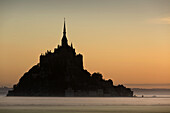 Silhouette of Mont-Saint-Michel at dawn, Bretagne, France