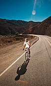 Endurance athlete Neil Sanchez trains with his road bike near Agua Dulce in the Antelope Valley.