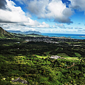 High angle scenic view of Oahu with Diamond Head on the background.