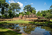 A deserted temple reflected in a lake in Siem Reap, Cambodia, Indochina, Southeast Asia, Asia