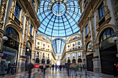 The shopping arcades and the glass dome of the historical Galleria Vittorio Emanuele II, Milan, Lombardy, Italy, Europe