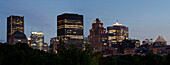 Skyline of office buildings illuminated at dusk, Montreal, Quebec, Canada
