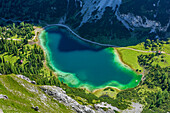 View towards lake Seebensee, from Ehrwalder Sonnenspitze, Mieming range, Tyrol, Austria