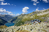 Hut Plauener Huette with barrier lake Zillergrund, Reichenspitze group, Zillertal Alps, Tyrol, Austria