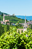 View of the village on the wine route with many churches, Tramin, South Tyrol, Italy