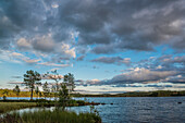 view with the last evening light over a lake near Munkfors, Varmland, Sweden