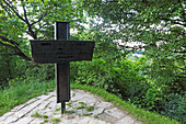 Summit cross on the hill made from gravel from WW II, Luitpoldpark, Schwabing, Munich, Bavaria, Germany