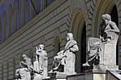 Statues decorating the entrance of the  Bayerische Staatsbibliothek, (v.l. Thukydides, Homer, Aristoteles, Hippokrates), Ludwigstrasse, Munich, Munich, Bavaria, Germany