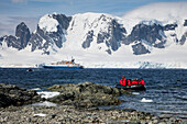 Zodiac raft from expedition cruise ship MV Sea Spirit (Poseidon Expeditions) Rongé Island, Errera Channel, Graham Land, Antarctic Peninsula, Antarctica