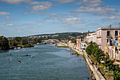 View over people kayaking in Rio San Juan and the city of Matanzas, Cuba, West Indies, Caribbean, Central America