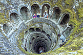 Top view of the spiral stairs inside the towers of masonic Initiation Well at Quinta da Regaleira, Sintra, Portugal, Europe