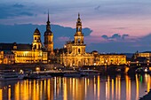 View of the Brühl Terrace with Hausmann Tower and Hofkirche and the river Elbe in the foreground at twilight, Dresden, Saxony, Germany, Europe