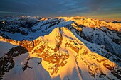 Aerial view of peaks of Ferro at sunset Masino Valley Valtellina Lombardy Italy Europe.