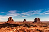 Monument Valley National Park, Utah, Arizona, Usa. The famous rock formations of the Mittens and the Merrick Butte.