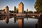 view of towers on the bridges of the Ponts couverts over the Ill river, part of the former defensive mechanism, Strasbourg, Alsace, France