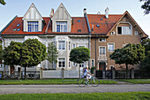 Cyclist on Malsenstrasse, Gern, Munich, Upper Bavaria, Bavaria, Germany