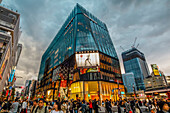 Crossing with pedestrians at Tokyu Plaza Ginza on a cloudy day, Ginza, Chuo-ku, Tokyo, Japan