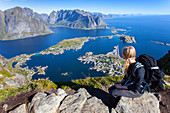 Young Woman, View, Reine, Fjord, Moskenesoya, Lofoten, Norway, Europe
