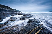 The incoming tide at Crackington Haven on the North Cornwall coastlline. England.