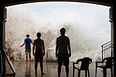 Waves crashing on pier, Zarautz, Gipuzkoa, Basque Country, Spain