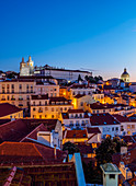 Miradouro das Portas do Sol, twilight view over Alfama Neighbourhood towards the Sao Vicente de Fora Monastery, Lisbon, Portugal, Europe