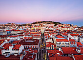Miradouro de Santa Justa, view over downtown and Santa Justa Street towards the castle hill at sunset, Lisbon, Portugal, Europe